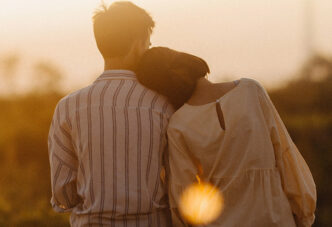Hear It from Others: Happy couple watching the sunset
