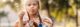 Down syndrome child blowing bubbles